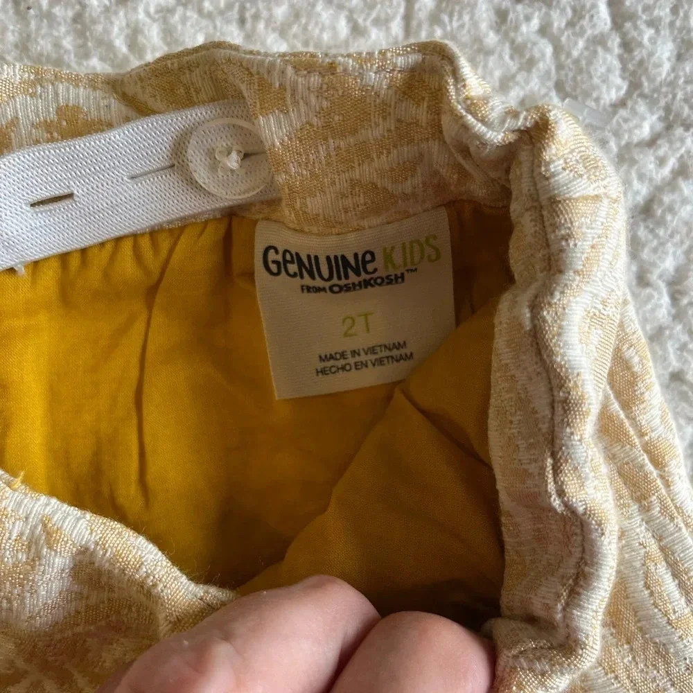 Oshkosh Genuine Kids yellow/ivory patterned skirt. 2T